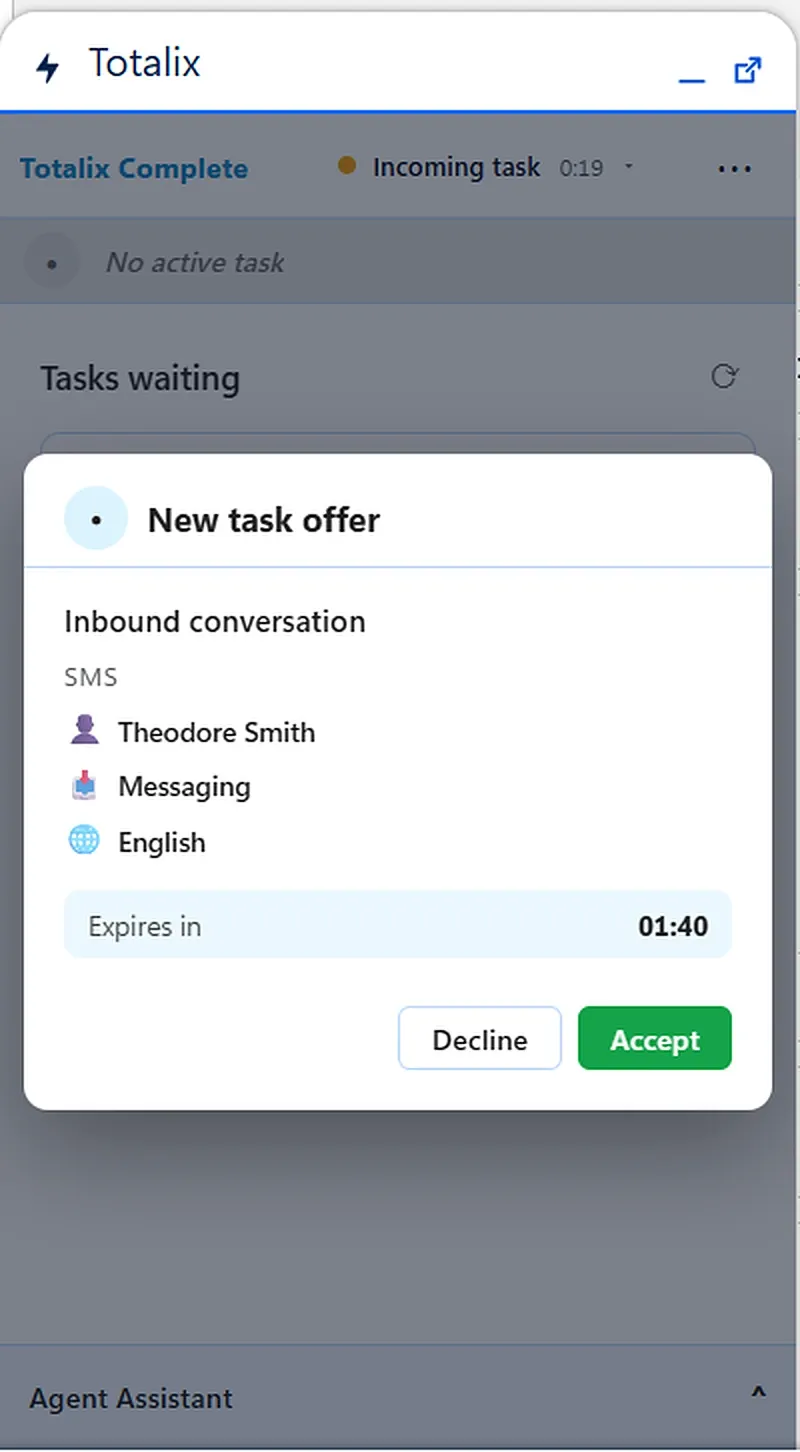 Salesforce Service Console on a desktop monitor with a Totalix new task offer for an inbound SMS conversation